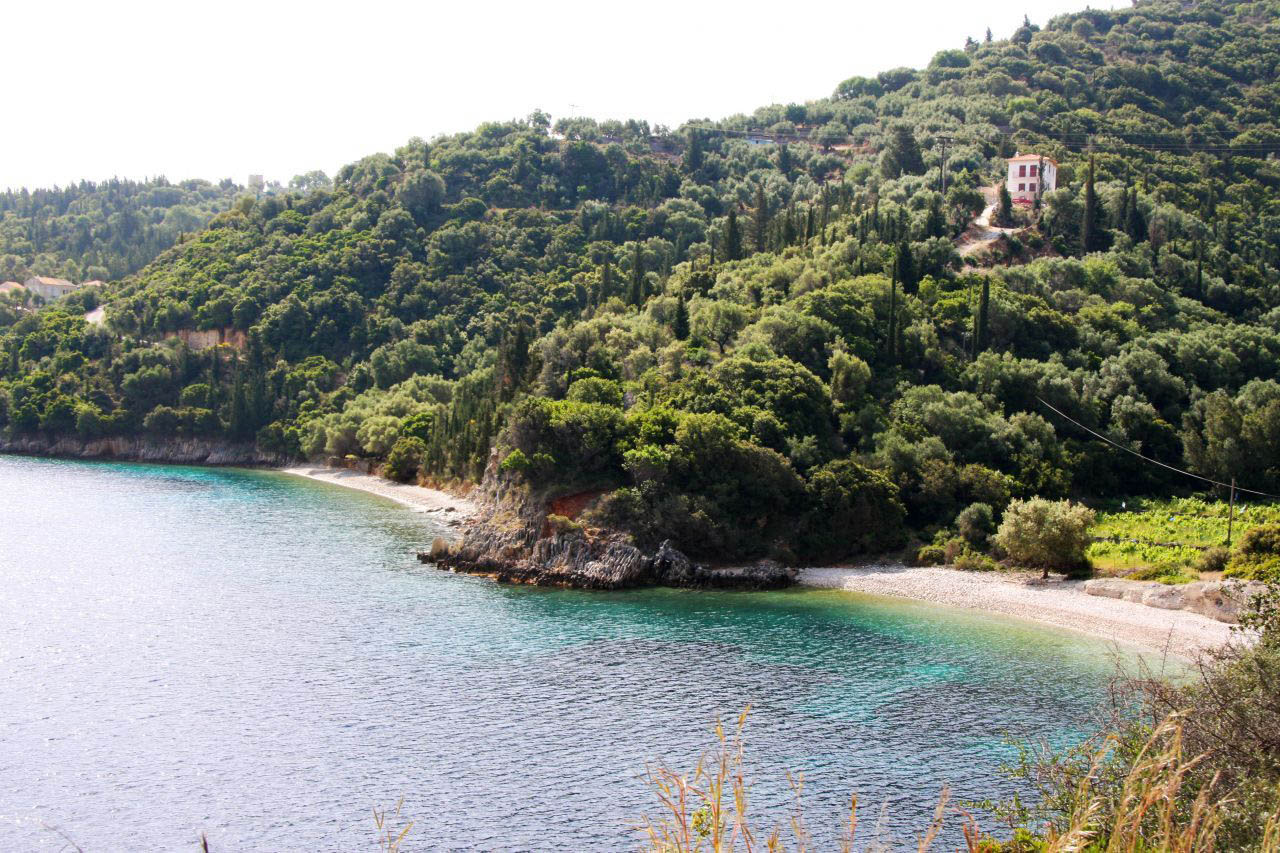Rachi: small pristine beach with lush vegetation and crystal clear waters.