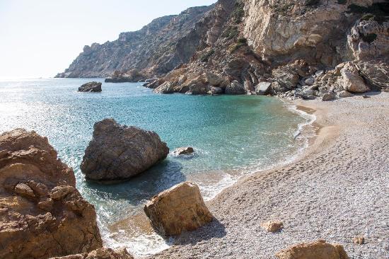 Karvounolakos: Small beach with rare natural beauty with clear waters and pebbles. Access to Karvounolakos is only by sea.