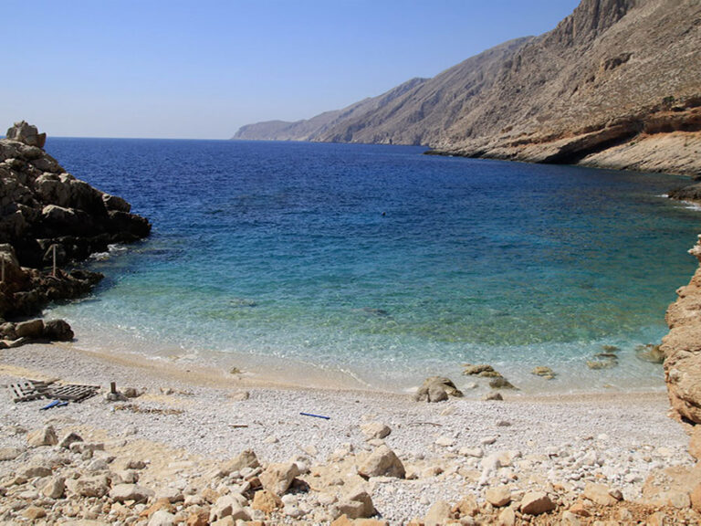 Giali: small pebble beach on the south side of Halki. Its turquoise waters will enchant you. It is accessible on foot, by car and by boat.